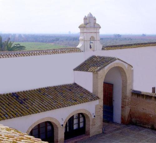 Hacienda Los Jinetes การ์โมนา ภายนอก รูปภาพ