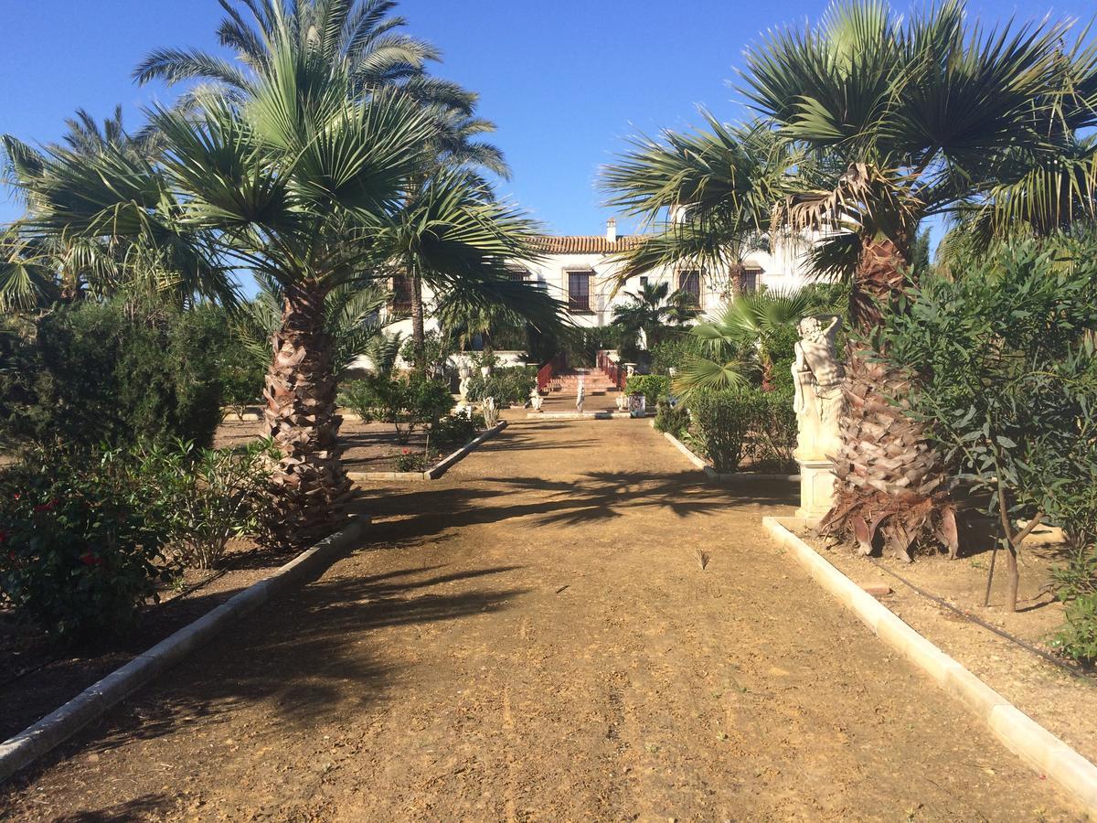 Hacienda Los Jinetes การ์โมนา ภายนอก รูปภาพ